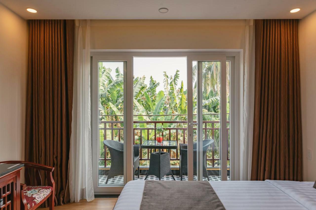Nu Ni Homestay Хойан Экстерьер фото
